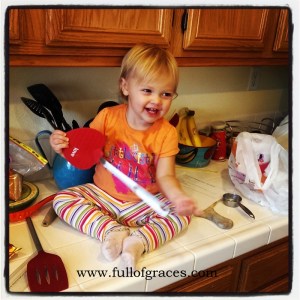 If you ignore that she's perched on the edge of the counter, isn't she the cutest helper ever???